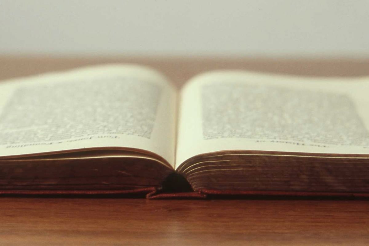 Close texture of cream paper with faint pencil marks
